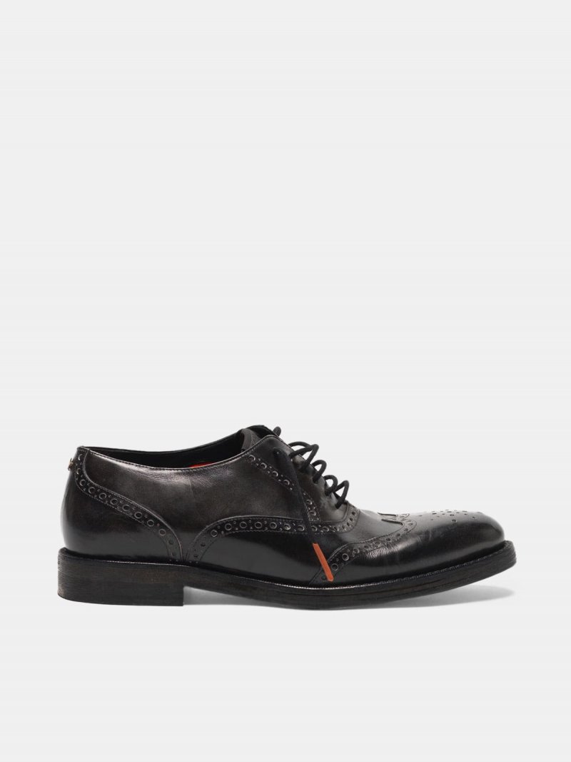 Ball shoes made of leather with brogue on the toe
