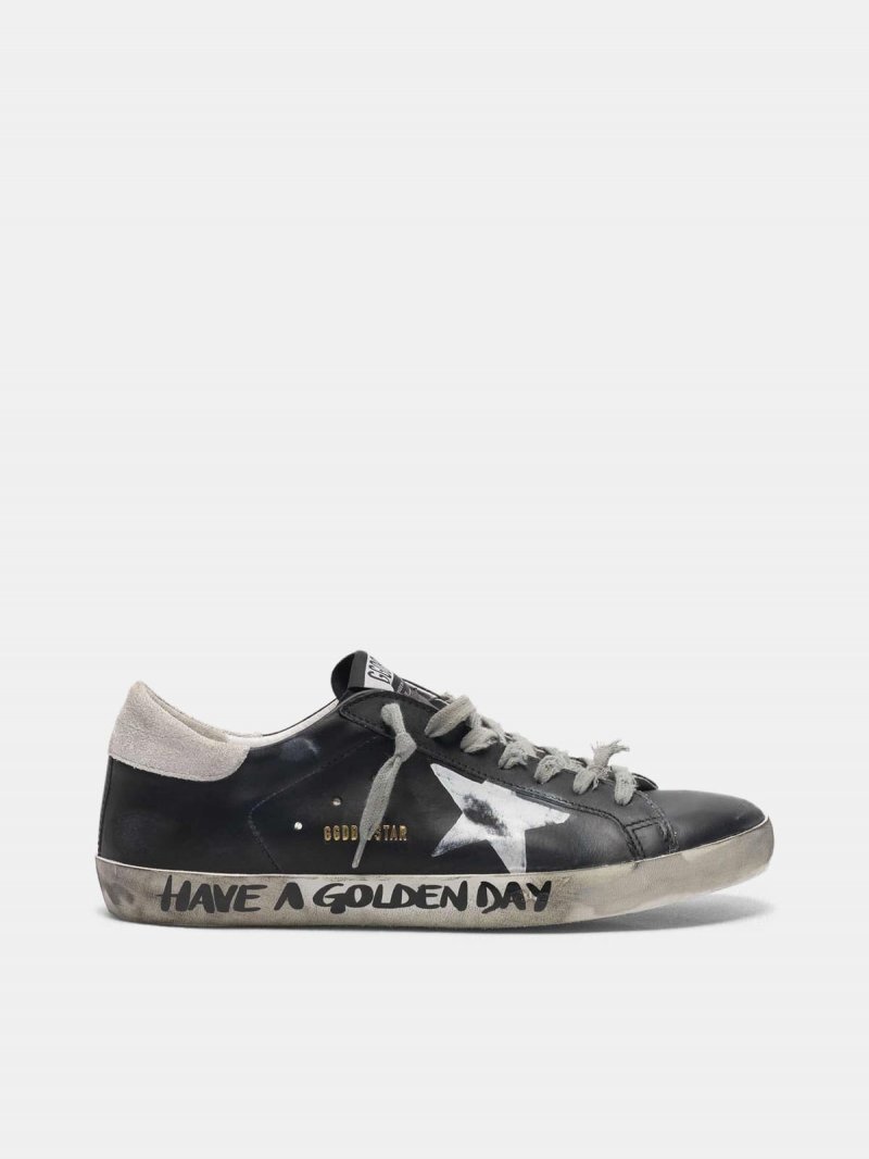 Black Super-Star sneakers with handwritten lettering