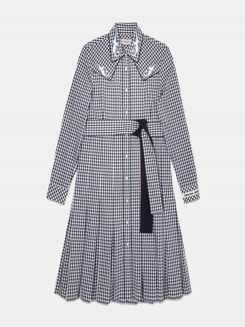 Olivia dress with black and white checks and cowboy-style decorations