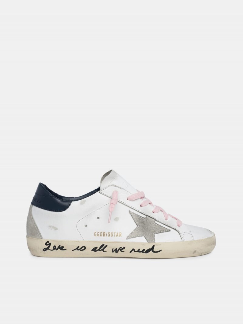 Super-Star sneakers with handwritten Love is all we need lettering