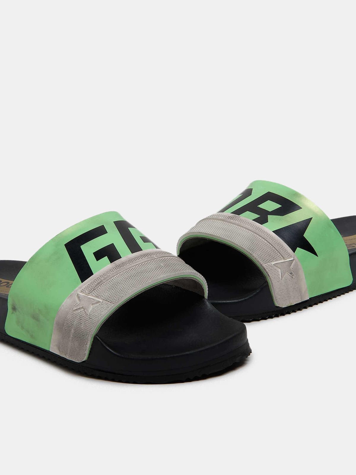 Black Poolstars for men with green strap and logo