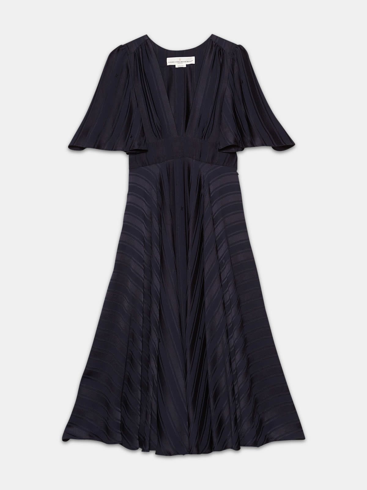Hana dress with belt at the waist and ruffles on the back