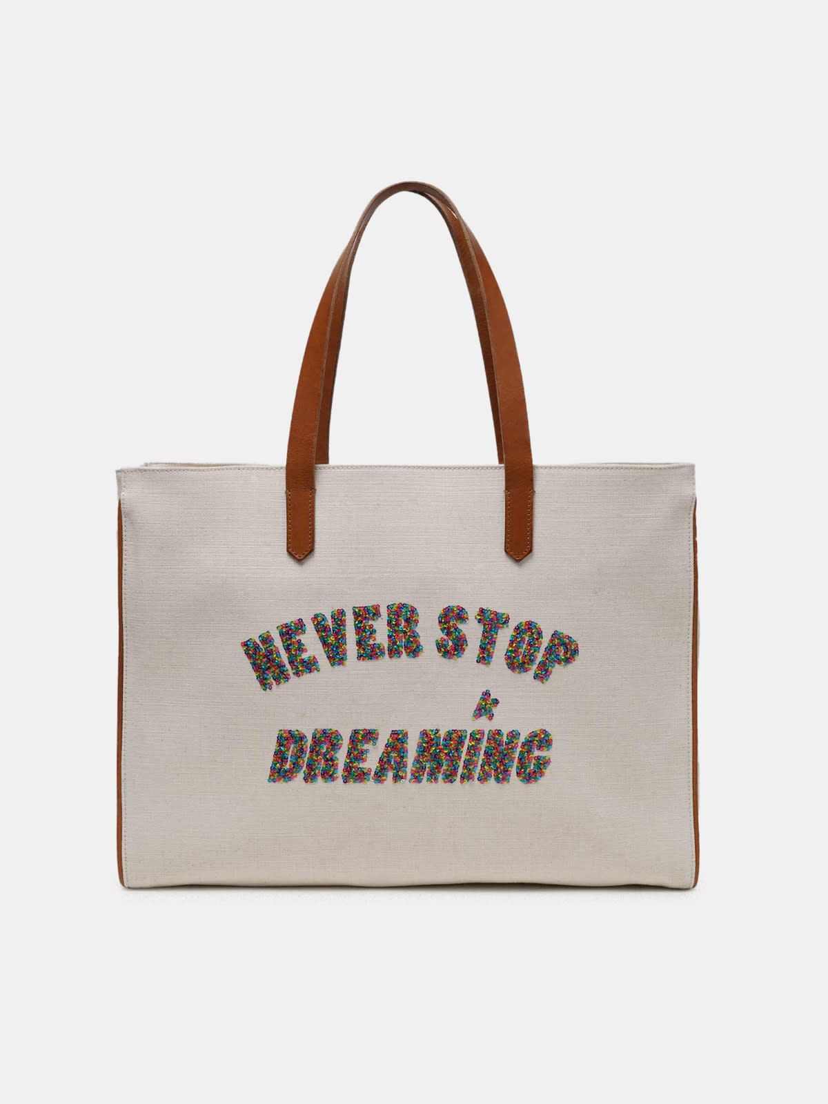 California East-West Never Stop Dreaming glitter bag