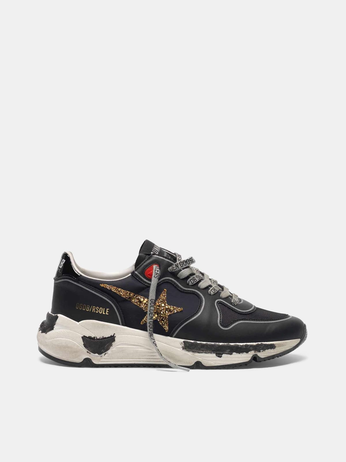 Black Running Sole sneakers with glittery gold star